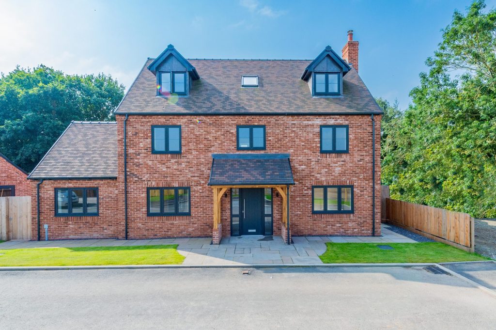 Cedar House, Plot 3, a 5-bedroom home at The Farmyard at Grafton, the front of the house